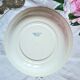 Mismatched antique flat plates made of ironstone accompanied by