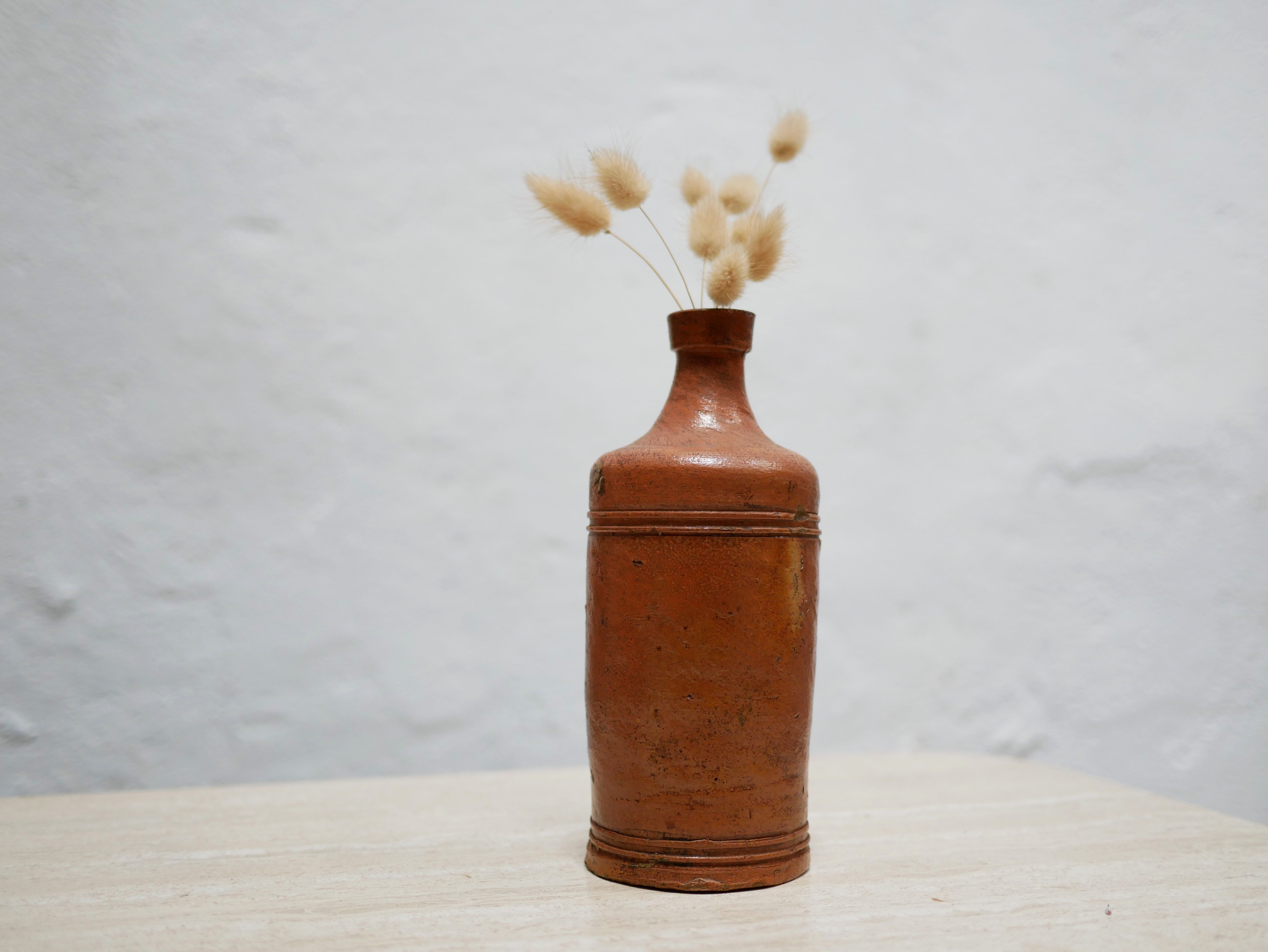 Bottle vintage glazed terracotta vase