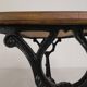 Bistro table with an oak top on a cast iron base, 1930s.