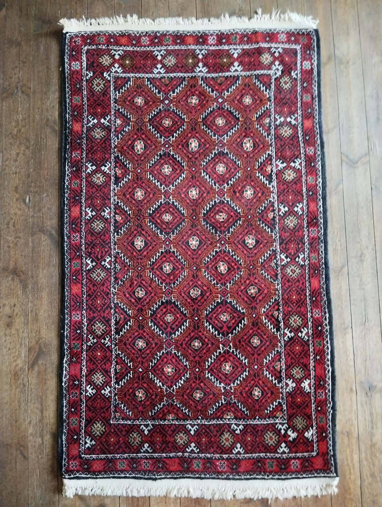 Handmade Belouch Persian rug 184x108cm