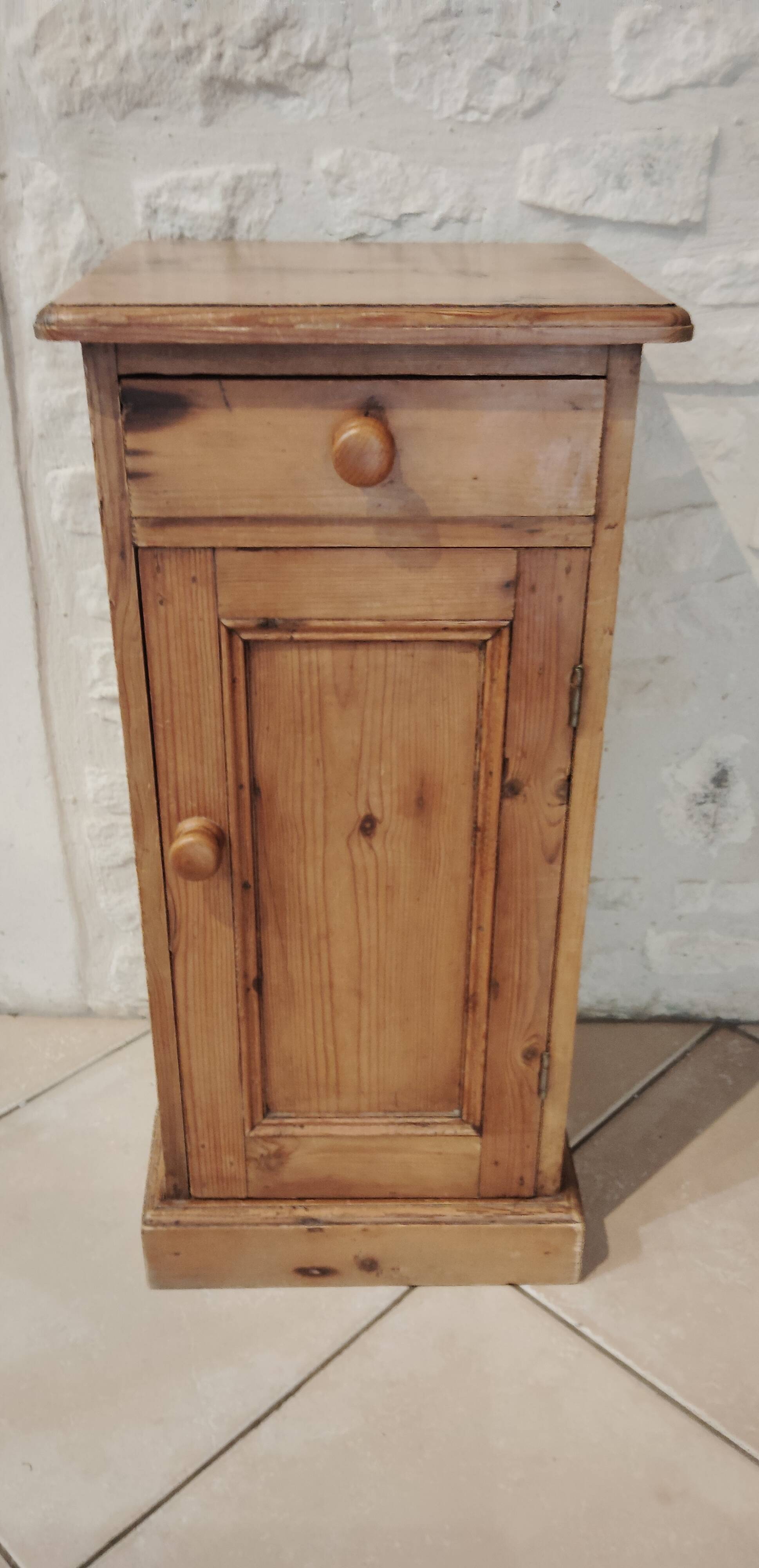 Old bedside table in old pine