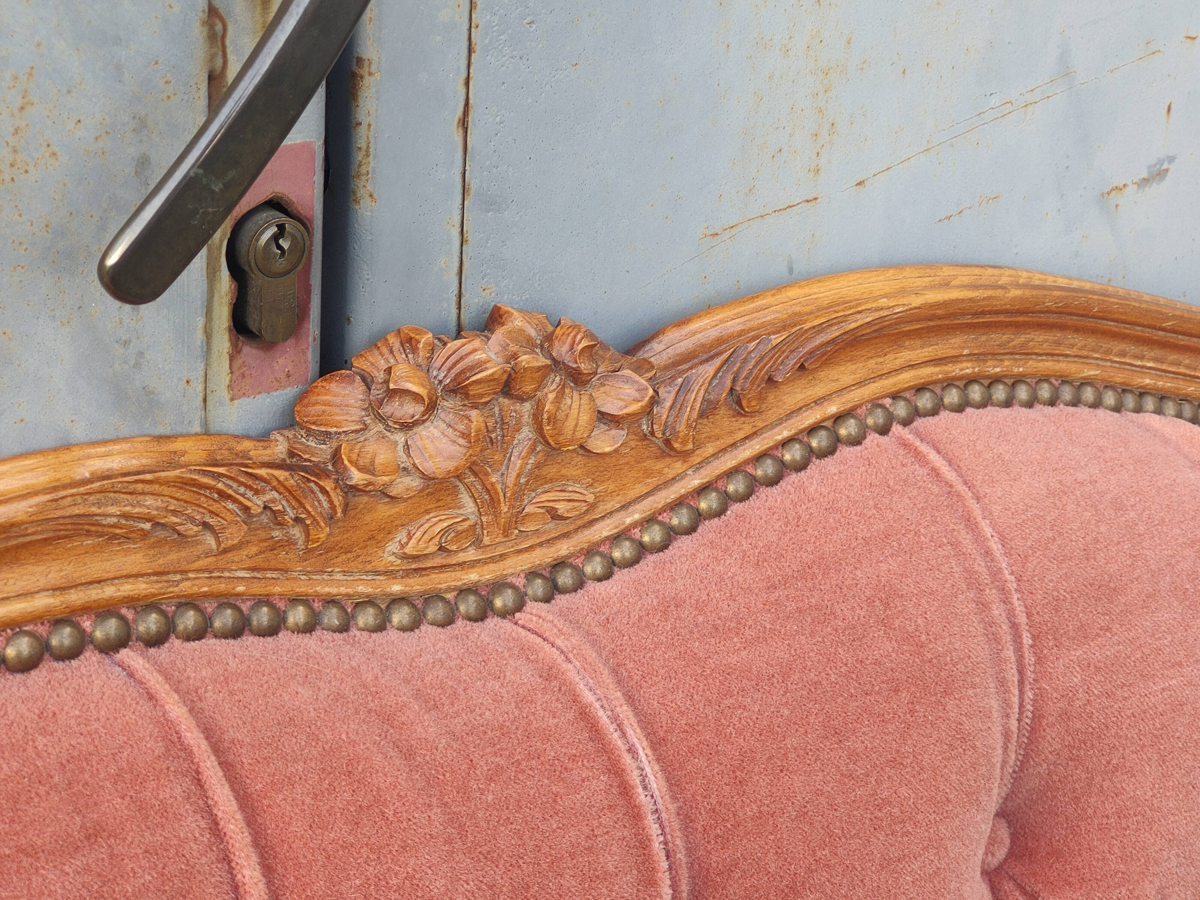 antique wooden and fabric headboard