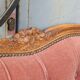 antique wooden and fabric headboard
