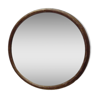 Old gilded wood oval mirror