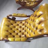 Pair of padded Chesterfield armchairs
