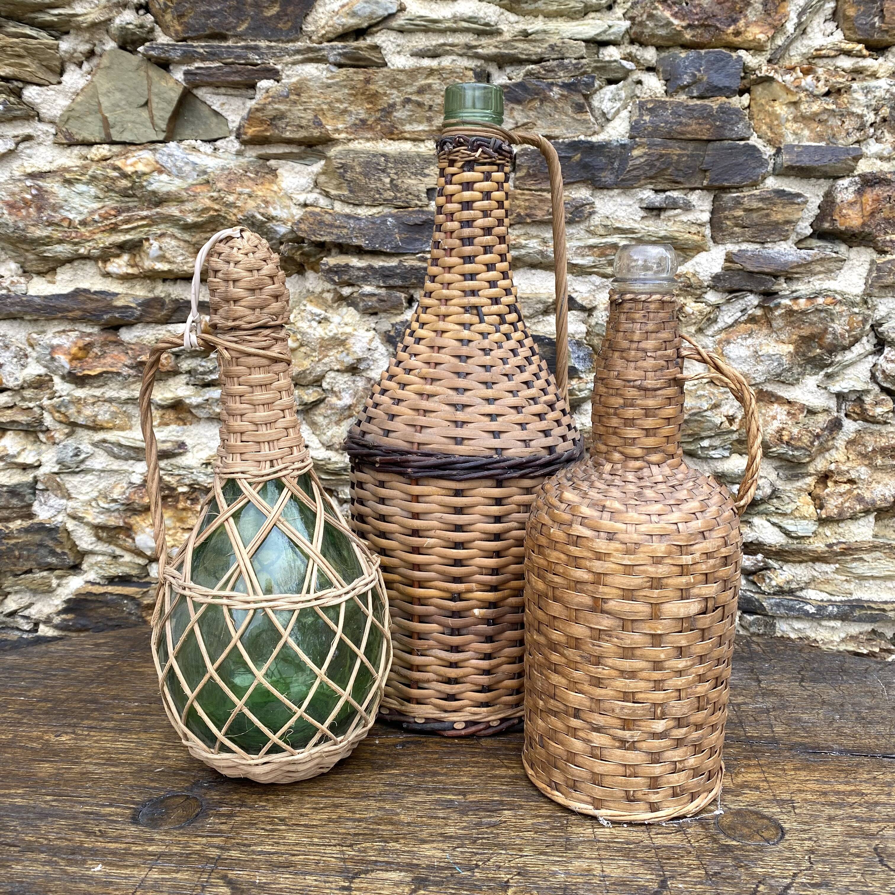 Glass bottles and rattan, woven wicker