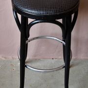 Pair of 1960s bistro bar stools in black and chrome with vinyl shell.