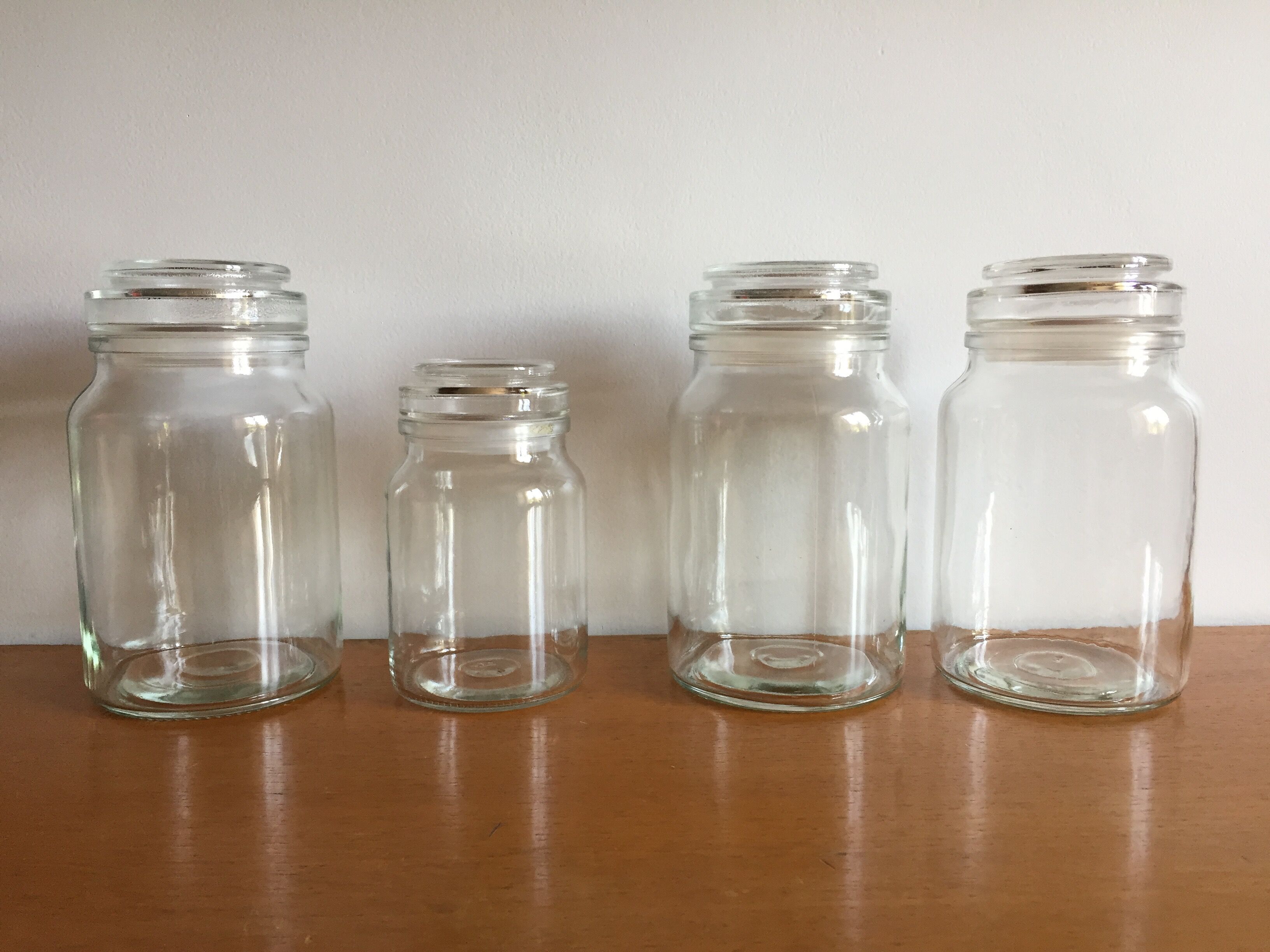Lot of 4 vintage glass jars