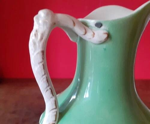 Green ceramic jug