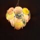 Handcrafted chandelier with Murano glass discs.