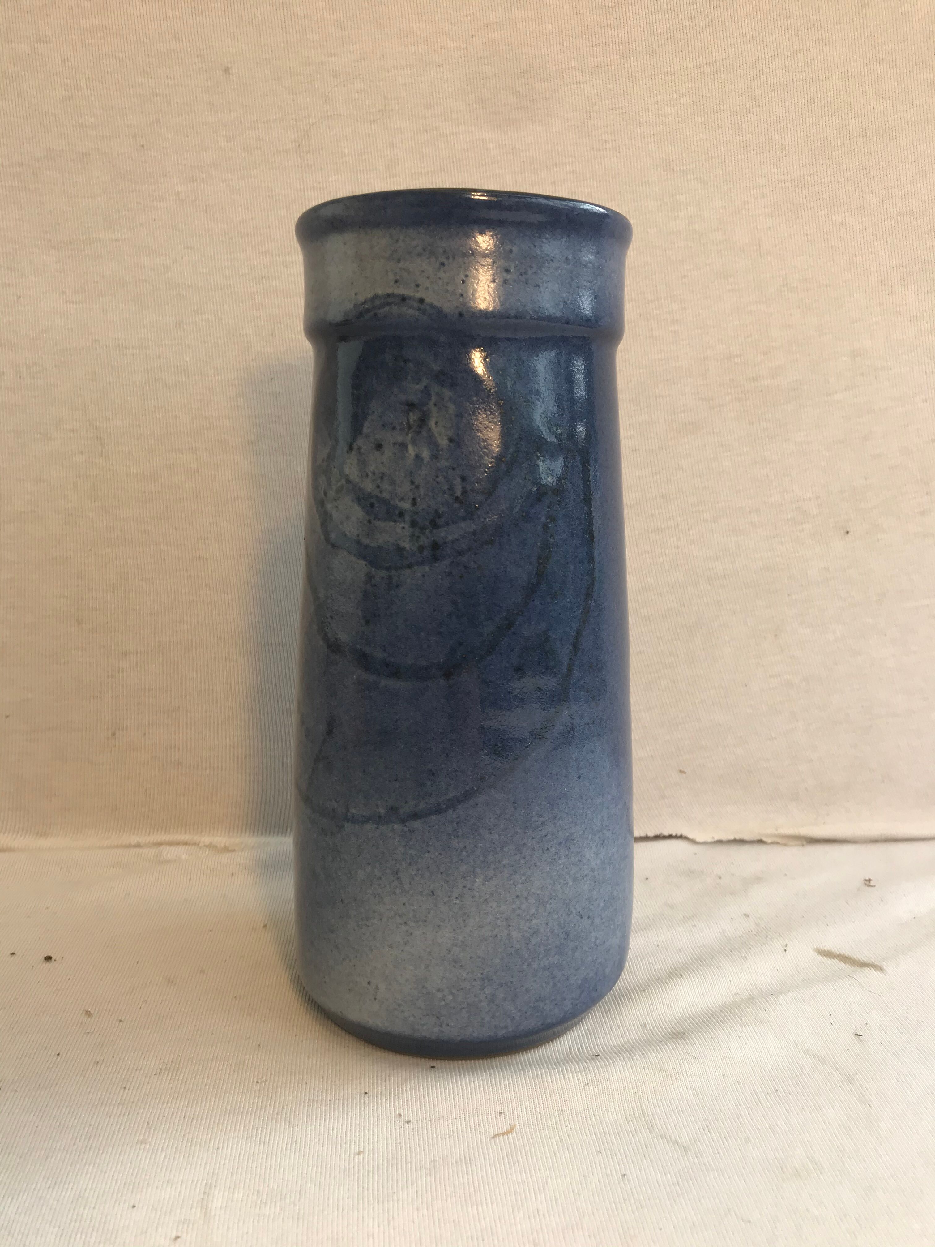 Old roll vase in blue sandstone