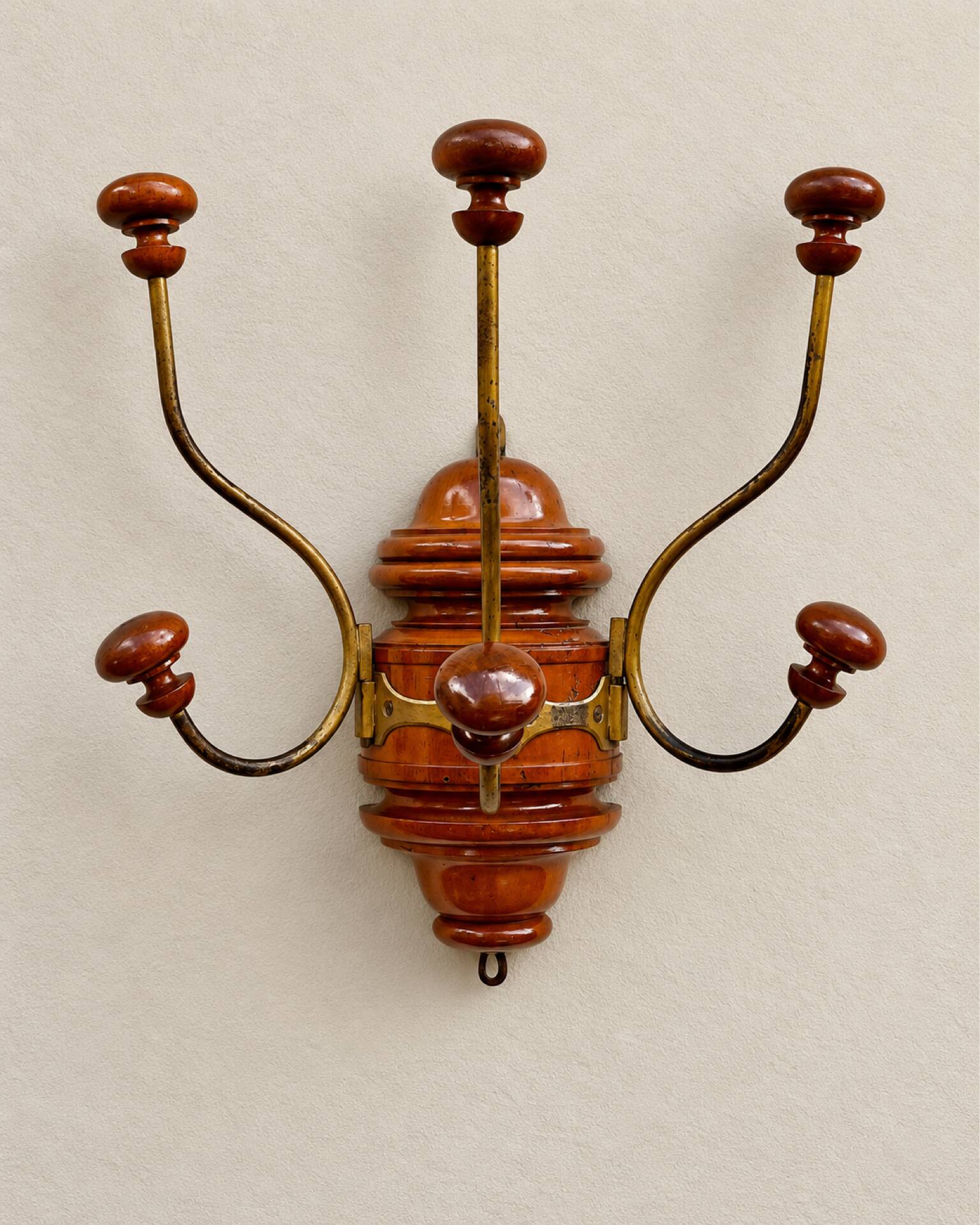 Antique wall coat rack in turned wood and gilded metal, circa 1900-1930.