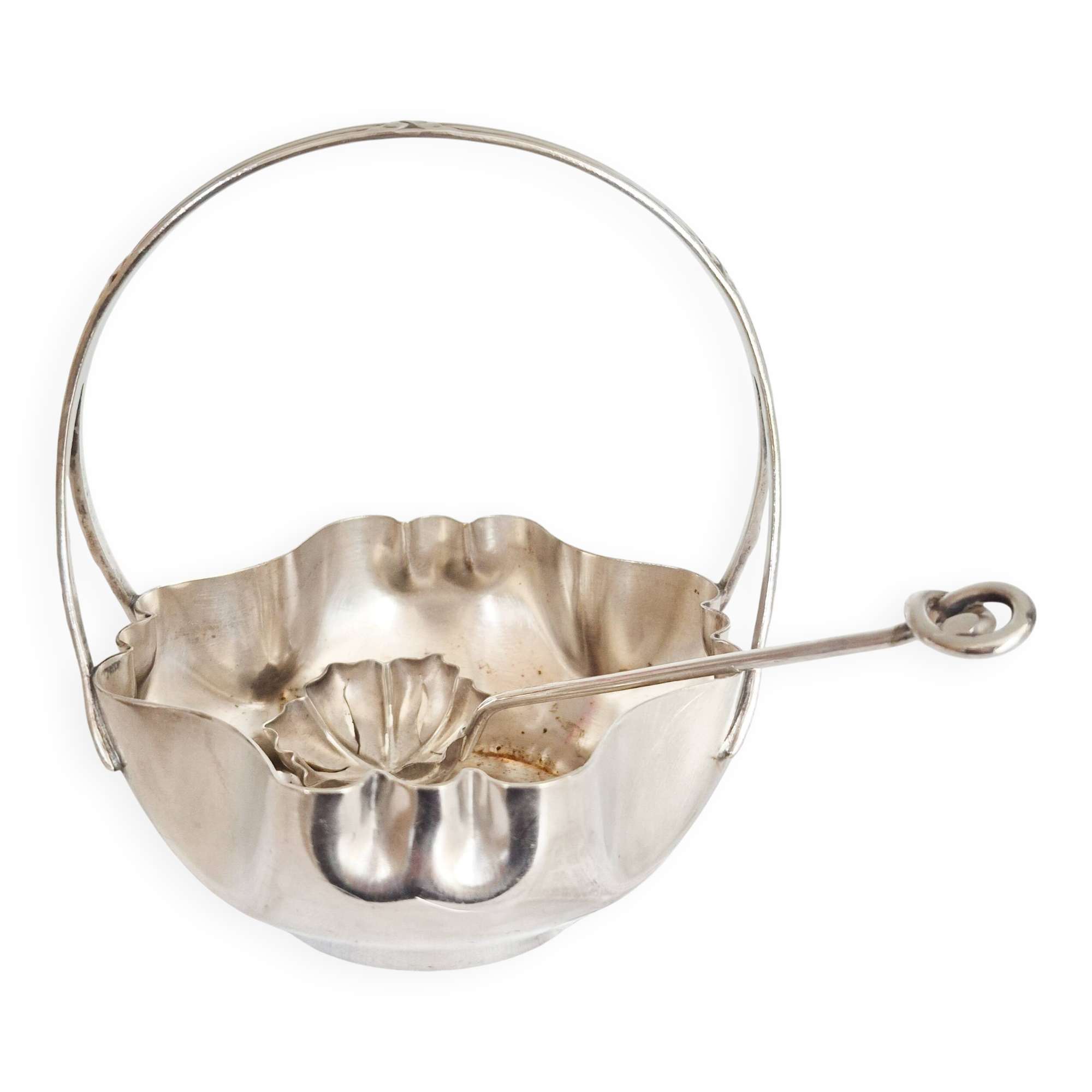 Antique silver sugar bowl with sprinkling spoon