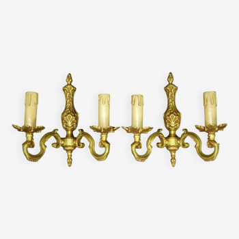 Pair of Louis XV / Regency style wall lights from Lucien Gau, Paris - bronze