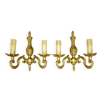 Pair of Louis XV / Regency style wall lights from Lucien Gau, Paris - bronze