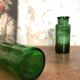 Green bubbled glass jars.