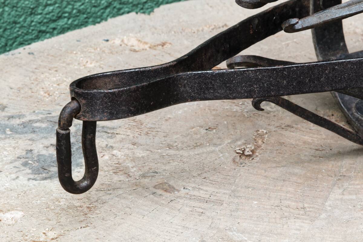 Riveted wrought iron cage suspension