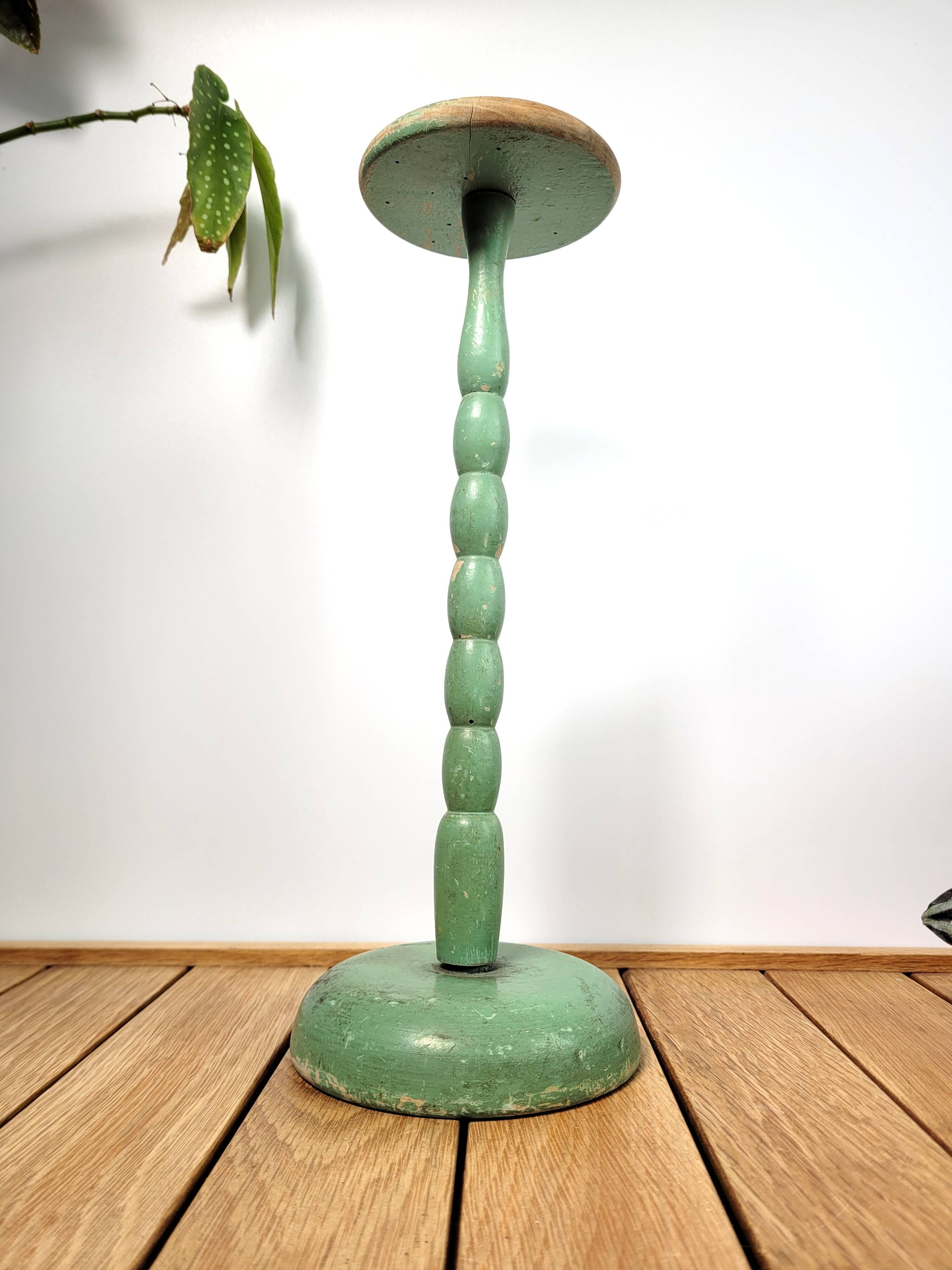 Old green hat holder