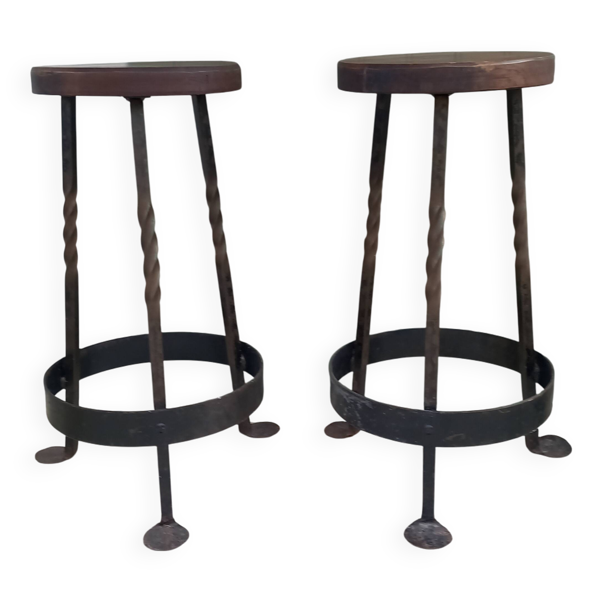 Pair of wrought iron and oak bar stools