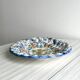 Hand painted decorative dish with floral motifs
