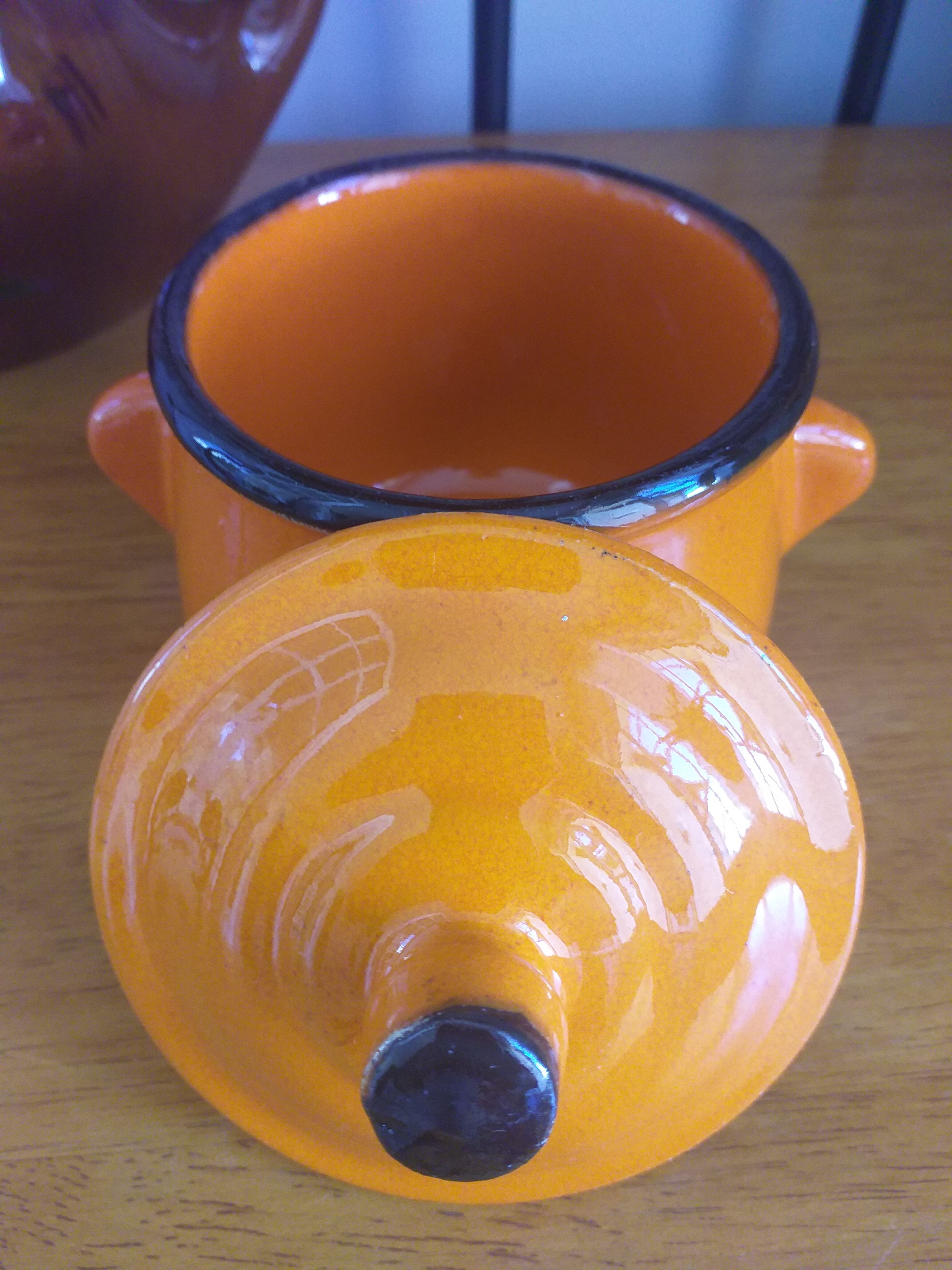 Sugar pot in orange enamelled sandstone
