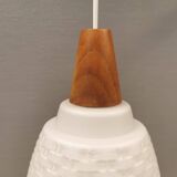 Lamp in white glass with teak top. It is Danish and estimated from the 1970s-1980s.