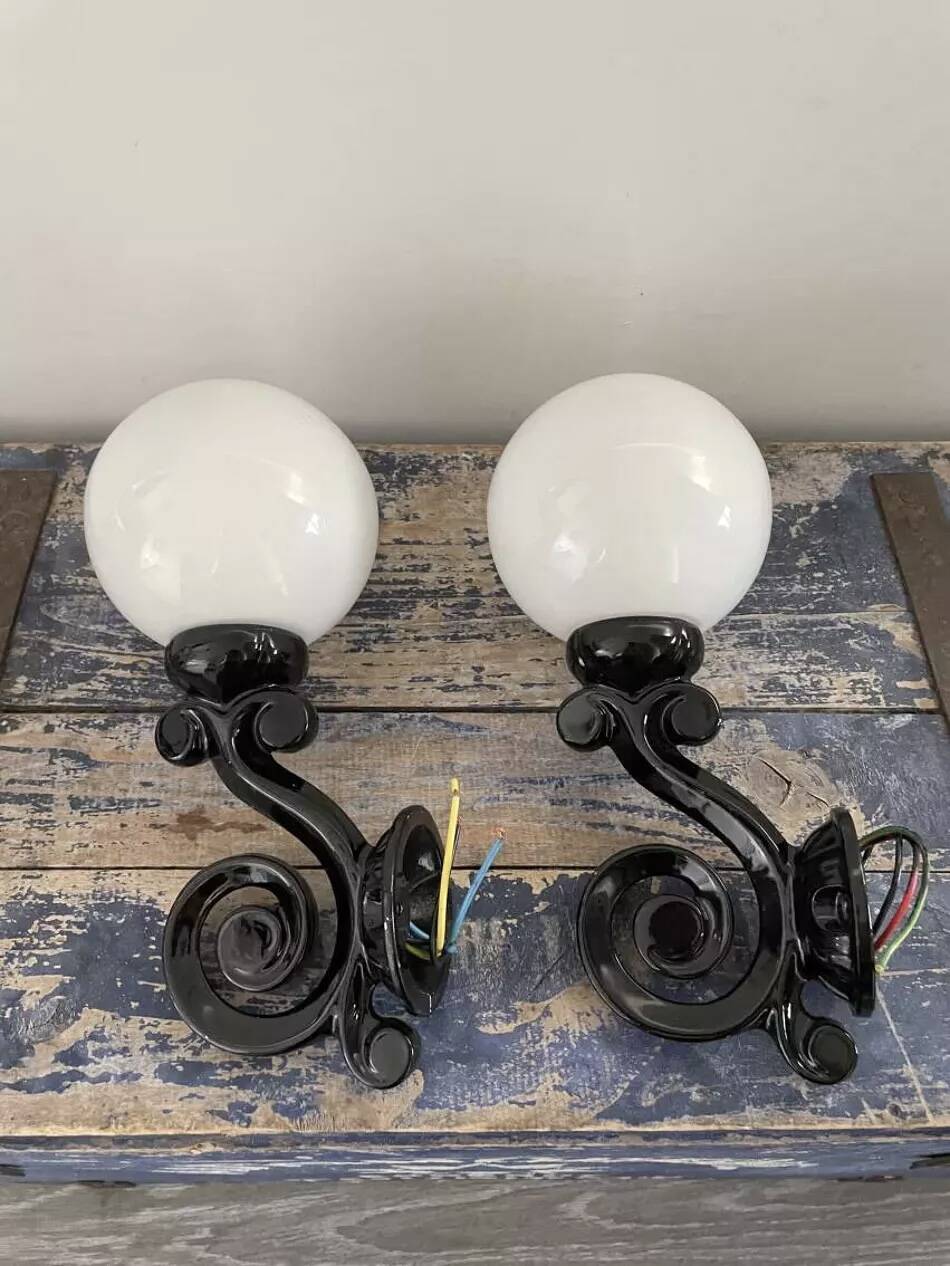 Pair of vintage enameled cast iron wall sconces