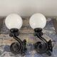 Pair of vintage enameled cast iron wall sconces