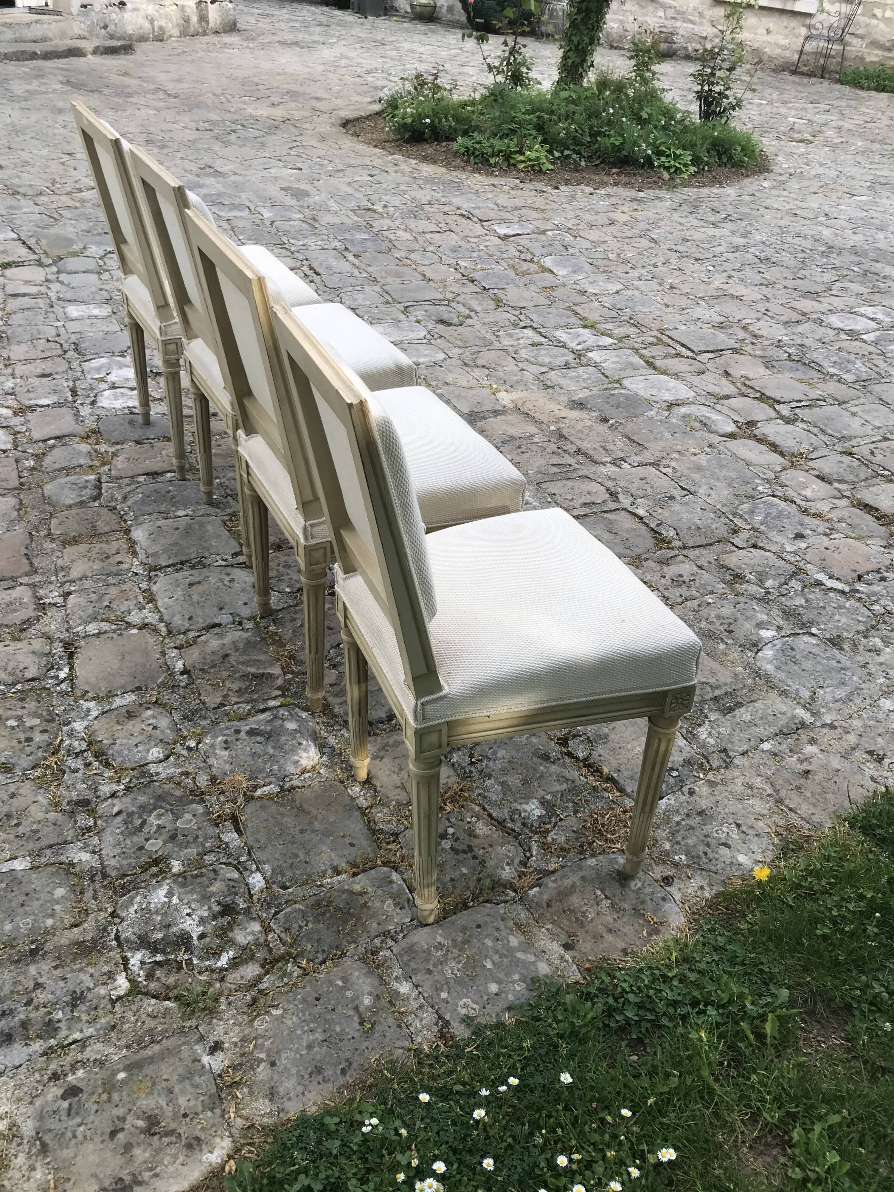 Series of 4 chairs of upholsterer style Louis XVI