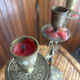 Vintage brass candelabrum engraved with three lights and a snuffer.