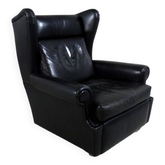 Black leather wingback chair on wheels 1960’s