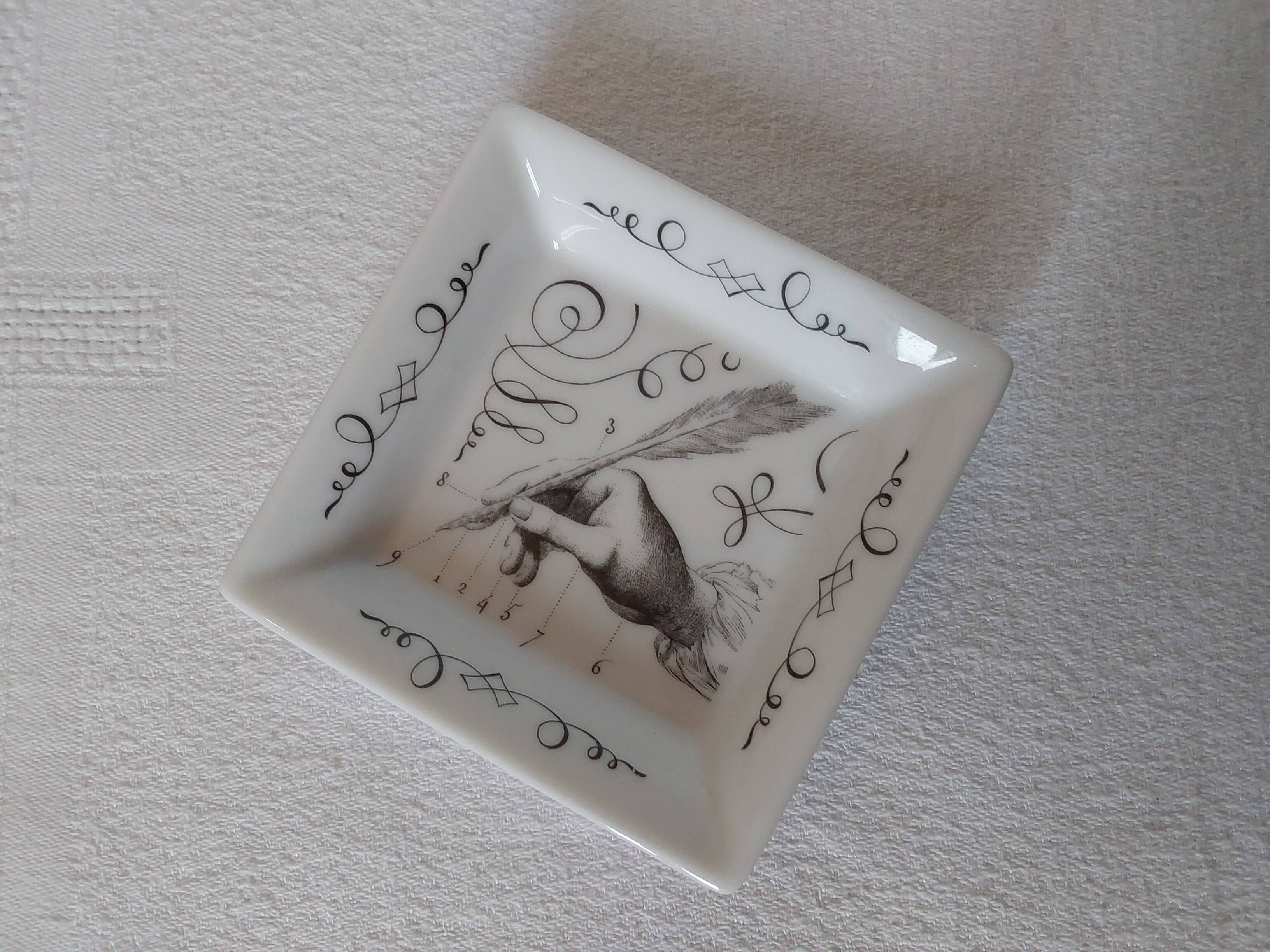 Mini Hermès pocket emptier