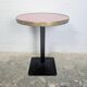 Pink and brass bistro table, Art Deco pyramidal base.