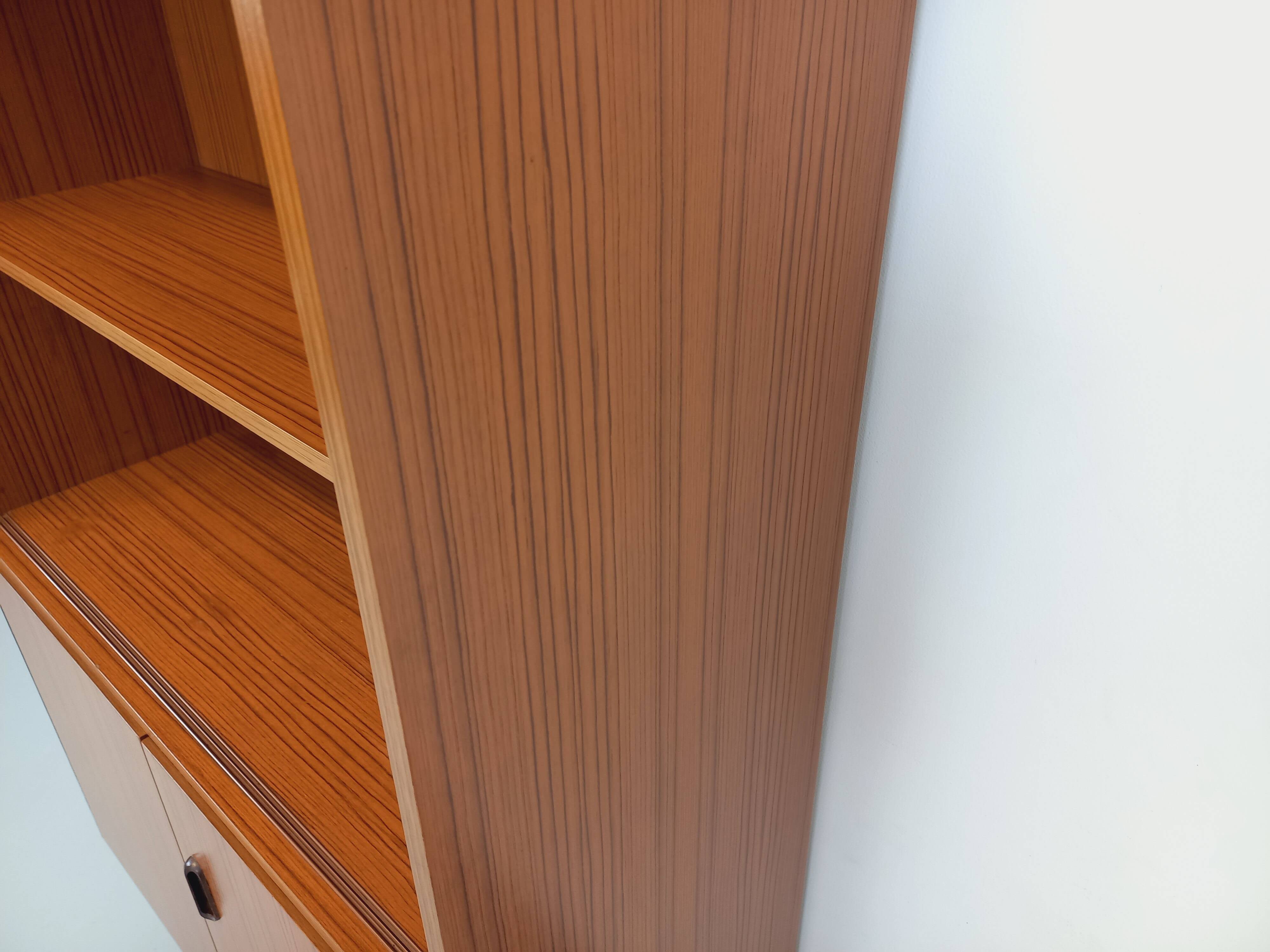 Vintage Scandinavian style storage bookcase in melamine and teak from the 60s