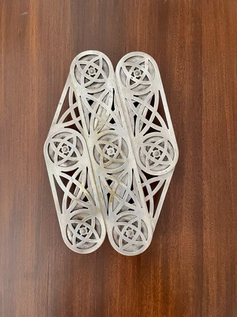 Art nouveau silver metal underside, retractable
