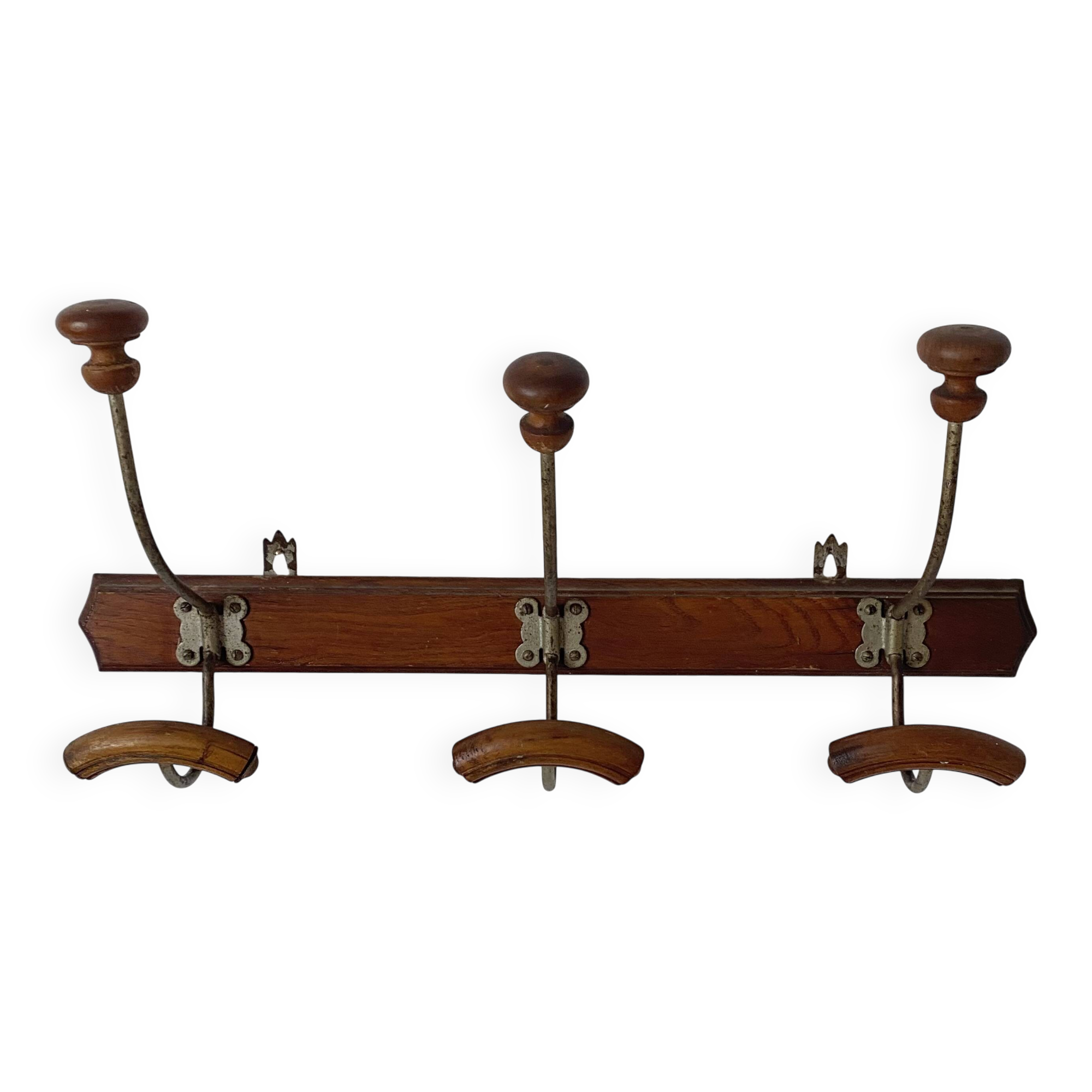 Antique wall-mounted coat rack in wood and metal