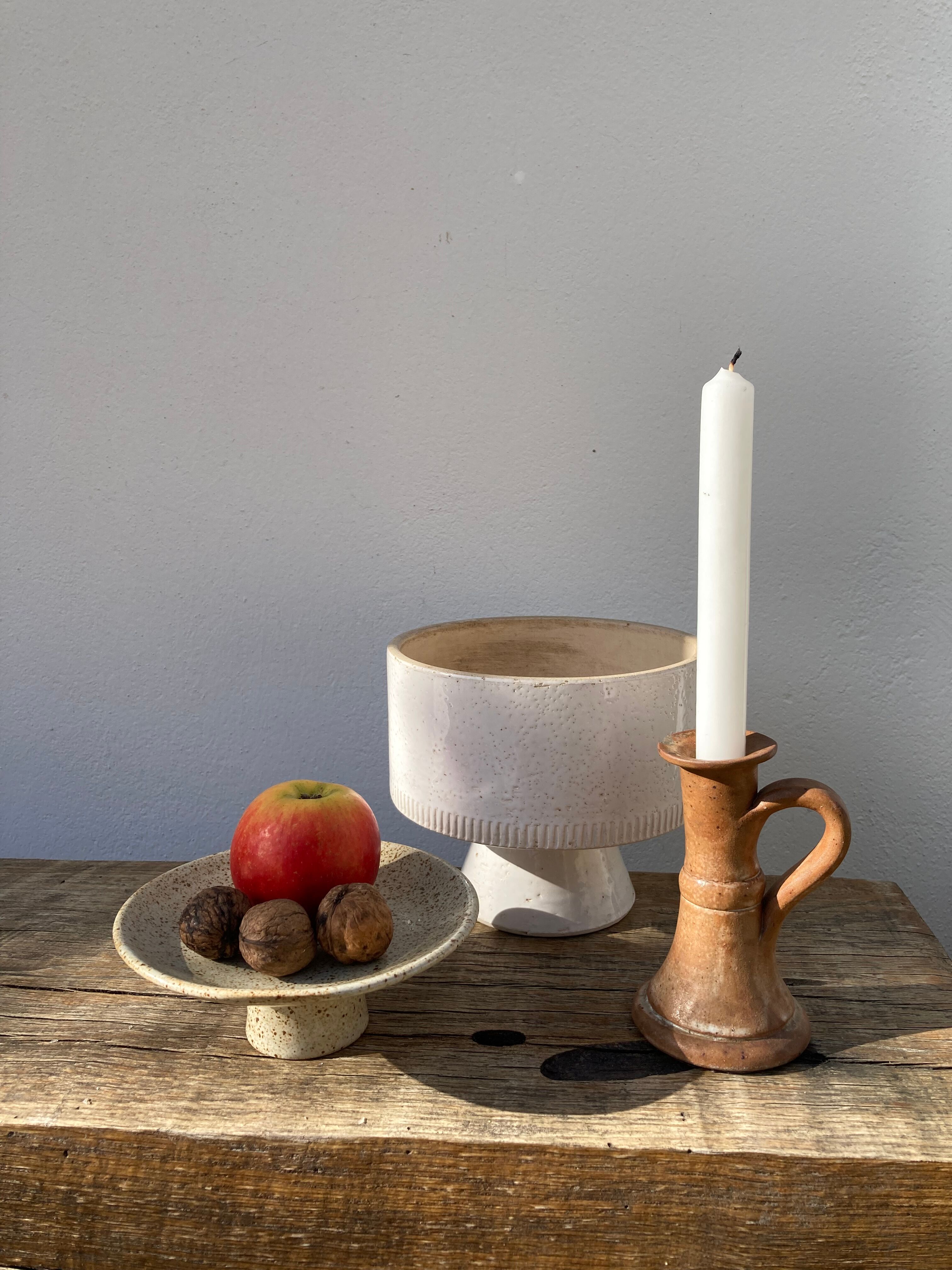 Candle holder in beige brown enamelled sandstone