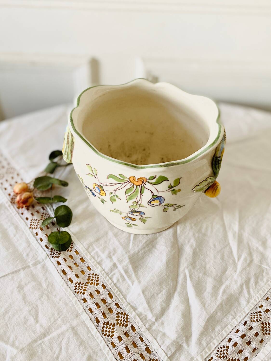Old earthenware pot cover from Moustiers, hand decorated