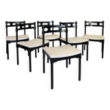 Set of six black lacquered wooden chairs.