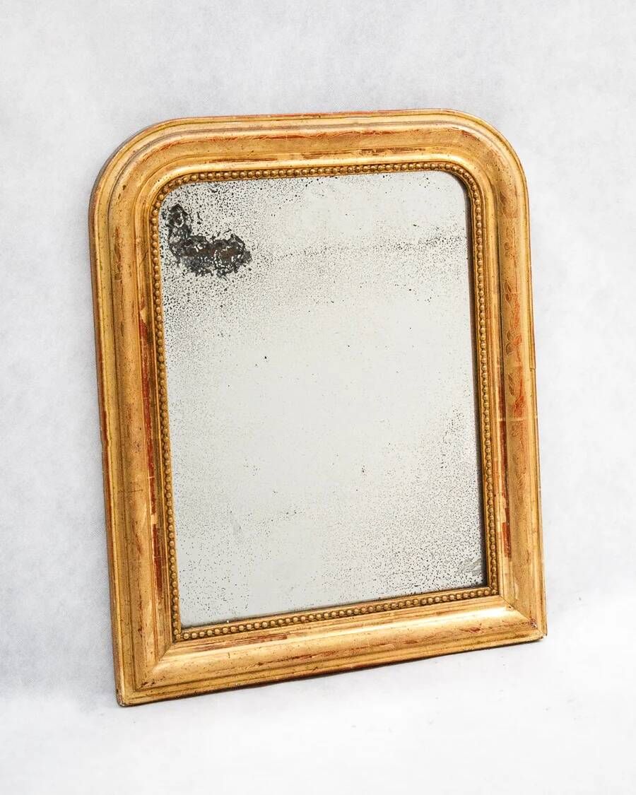 Set of two small French Louis-Philippe gilt red mirrors from the 19th century.