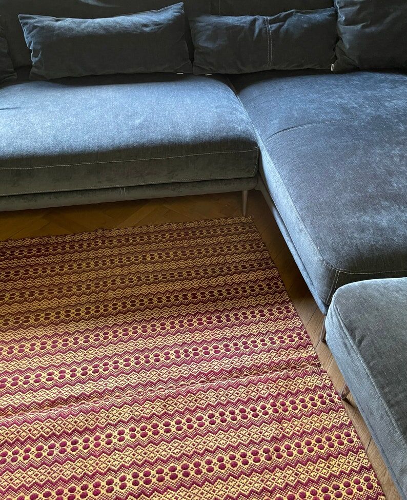 Romanian vintage carpet brown design on a yellow background