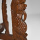 Asian coffee table carved with dragons and peacocks, Indonesia, early 20th century