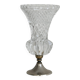 Small vase on a metal stand with thick glass.