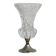 Small vase on a metal stand with thick glass.
