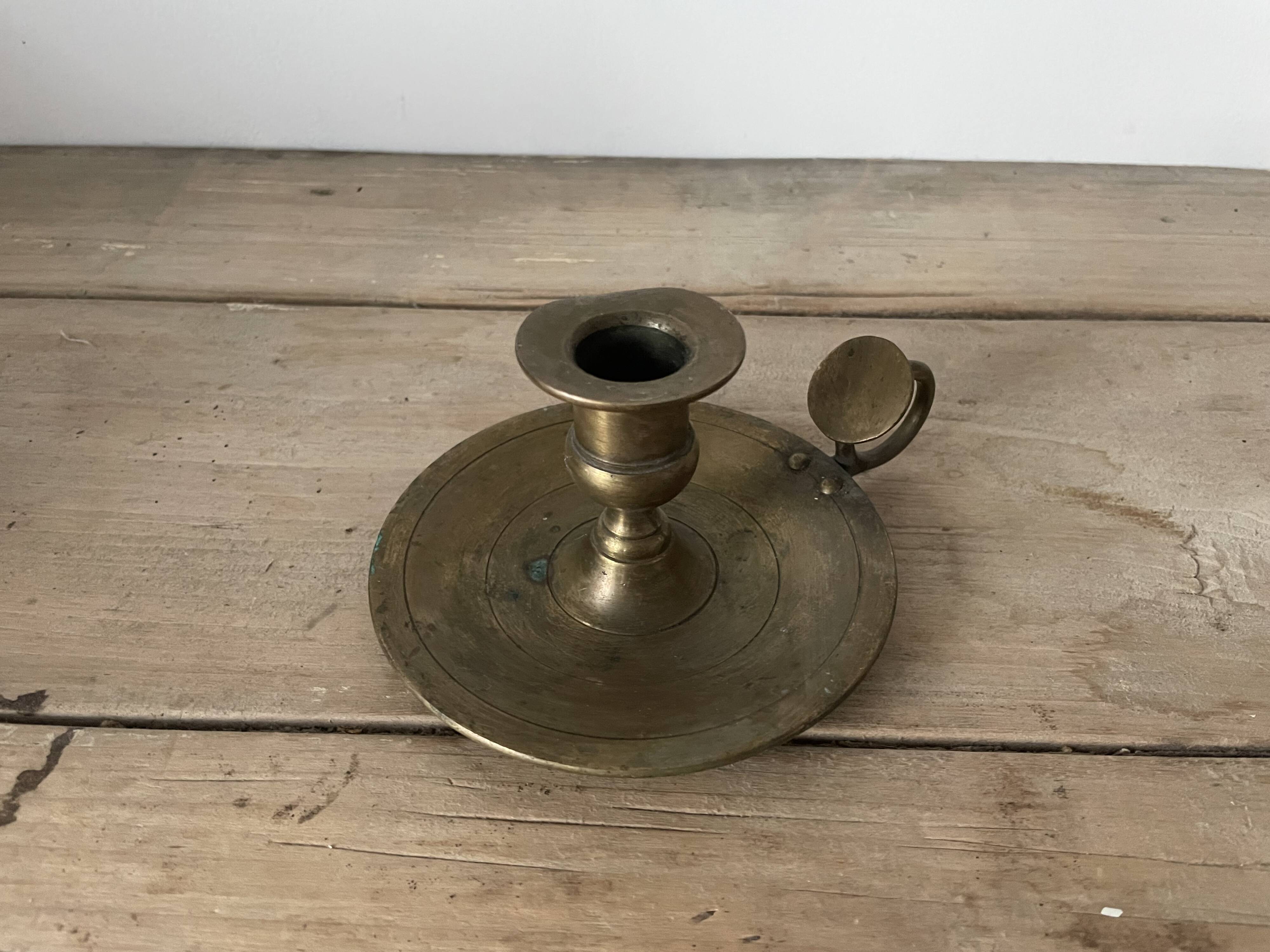 Old brass candle holder