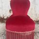 Vintage burgundy velvet armchair with fringes – theatrical and elegant