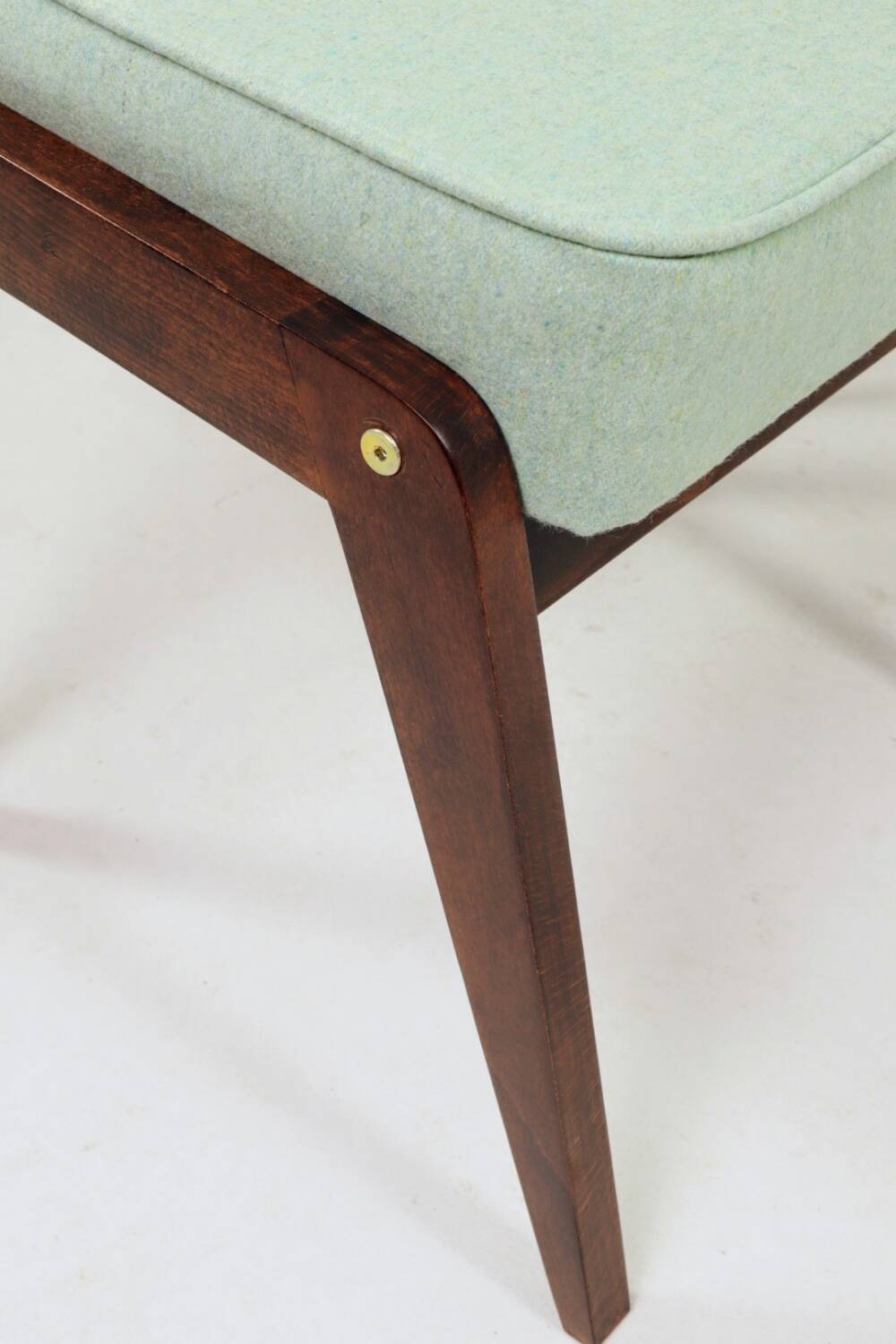 Vintage children's chair stool in pistachio green, mid-century modern design.