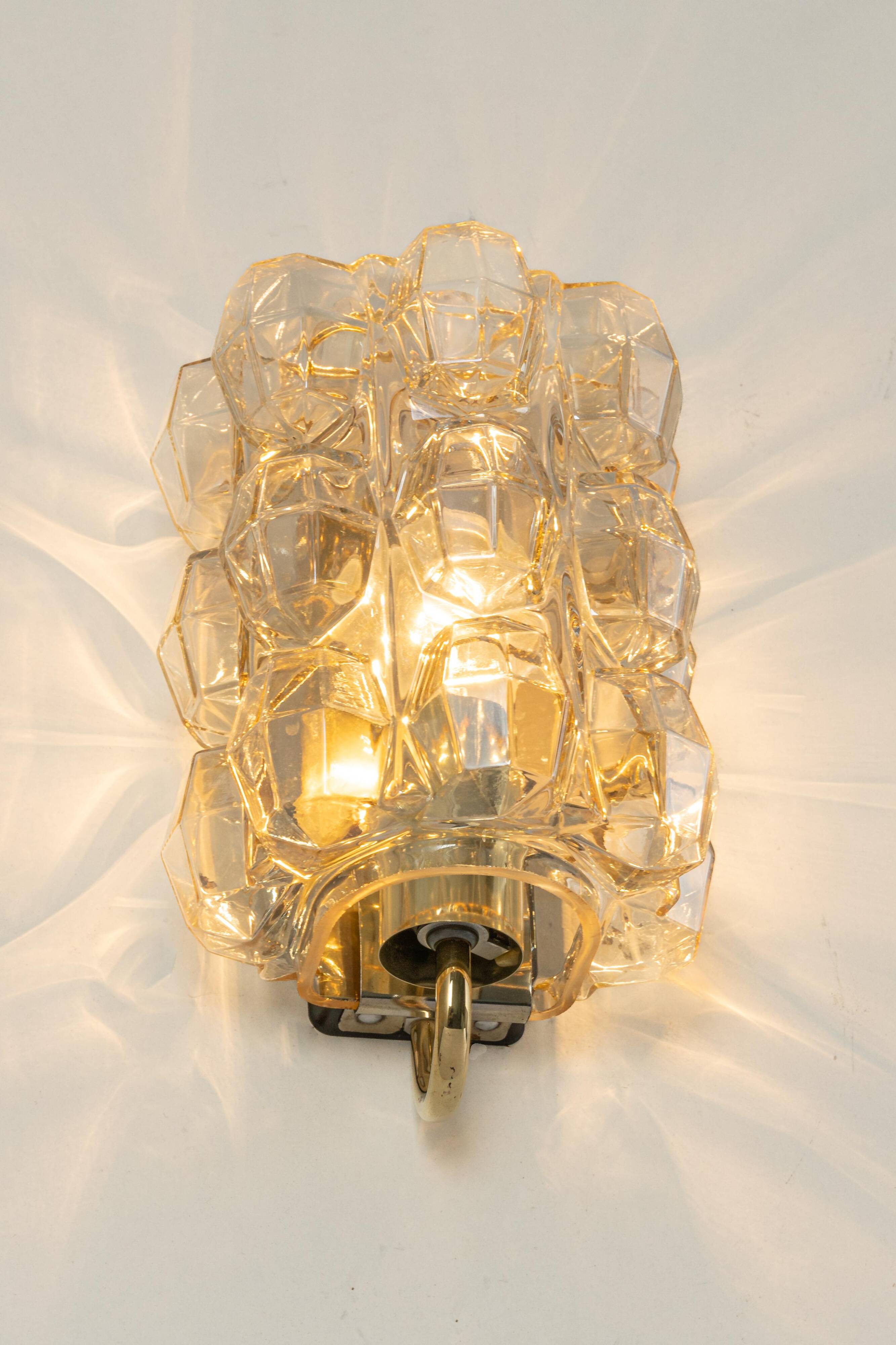 Large amber wall lamp in bubble glass by Helena Tynell, Limburg, Germany.