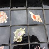 Vintage ceramic coffee table by Guy Trévoux with wrought iron base.