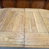 Round table in solid oak with its two extensions.